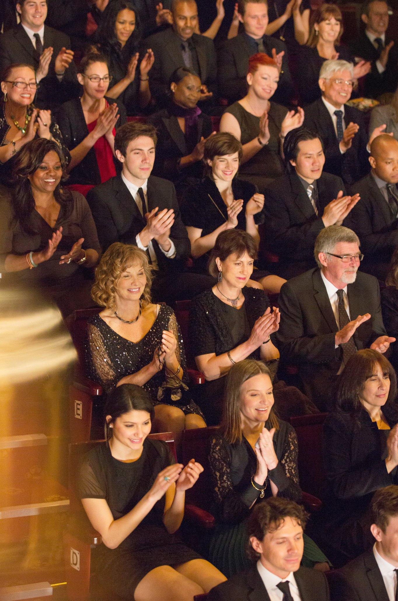 Clapping theater audience